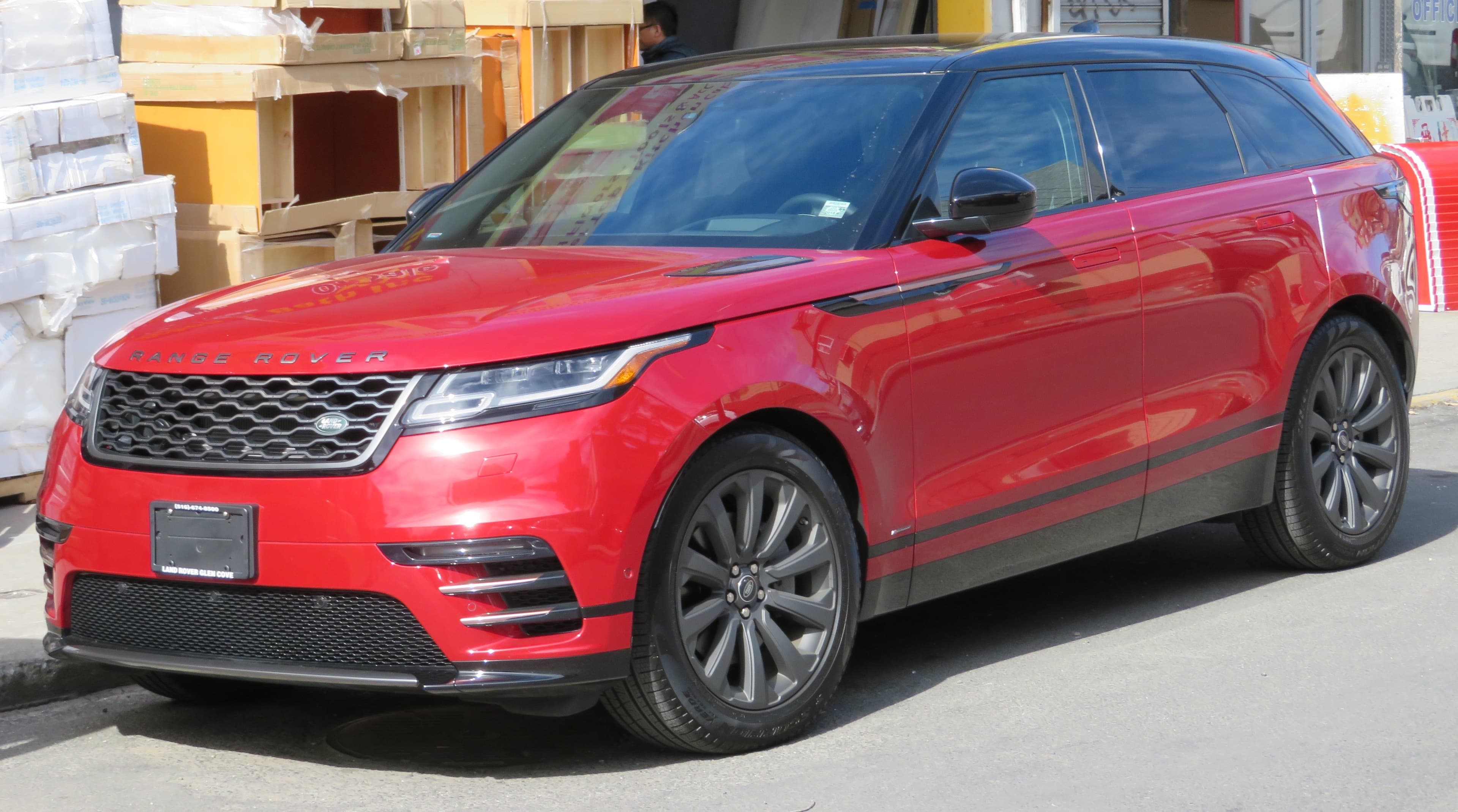 Luxury crossover parked outdoors, illustrating new-car lease deal shopping